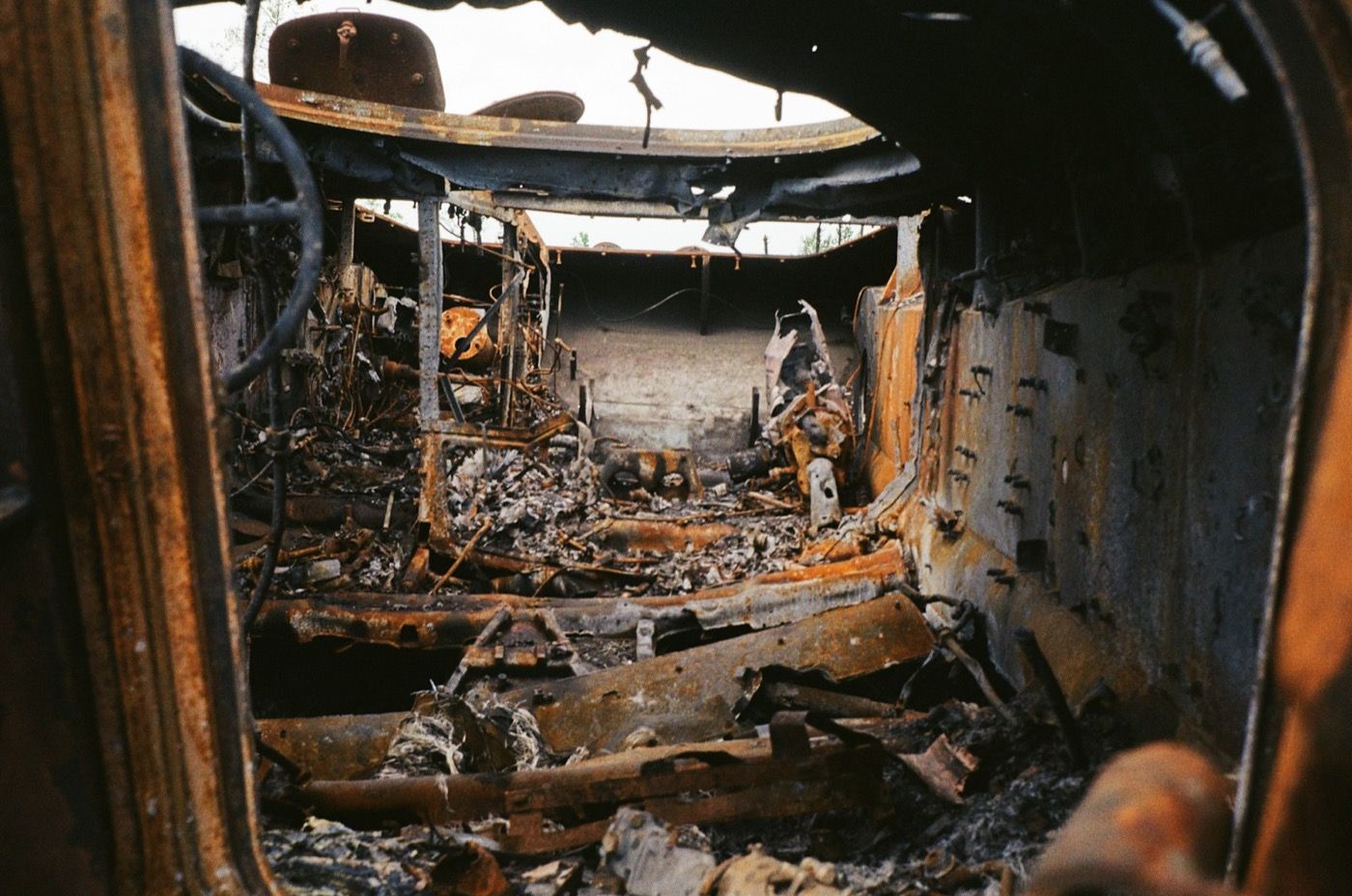 Room interior charred by fire, with debris on the floor